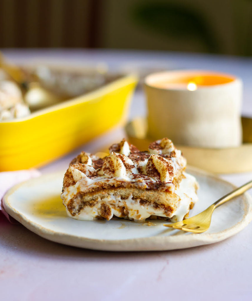 Tiramisu scooped out on a small plate