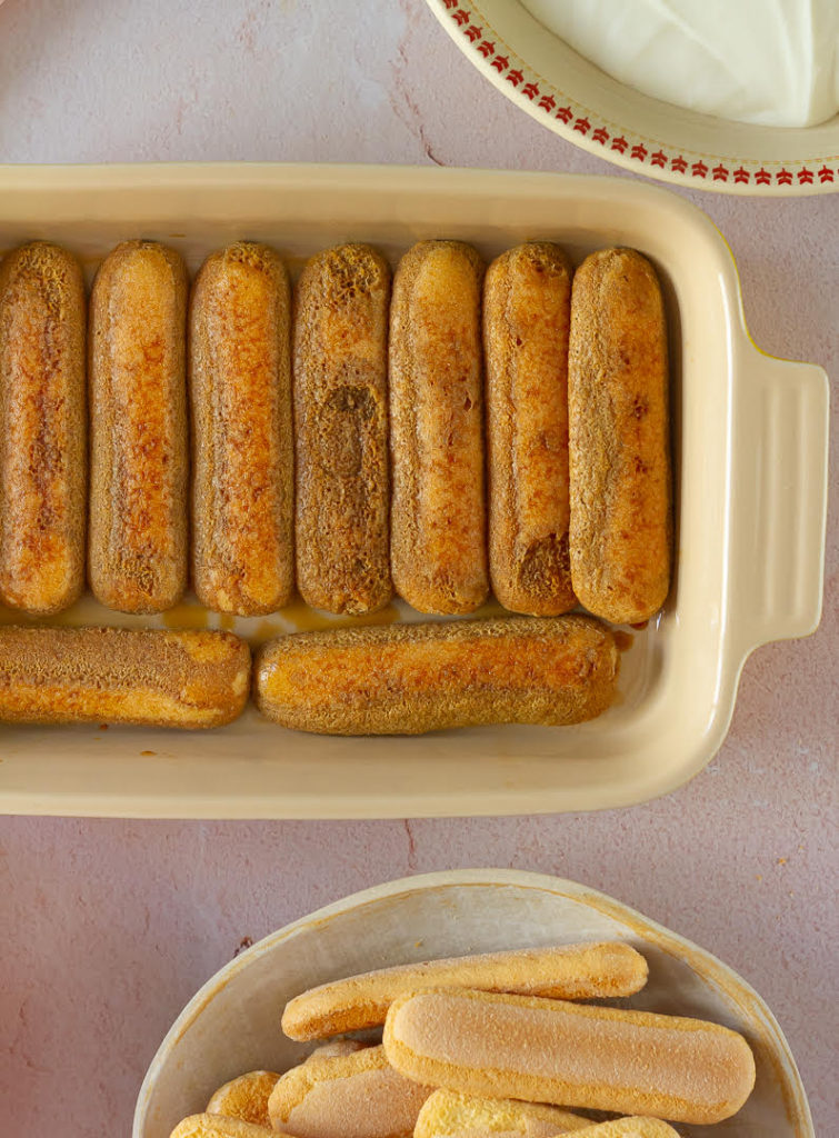 Layer the coffee soaked ladyfinger cookies