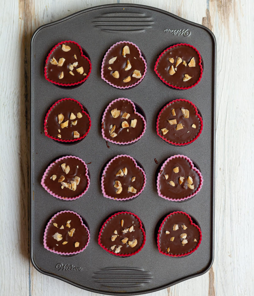 ready to eat Peanut Butter Chocolate Oat Cups in a mini muffin tray