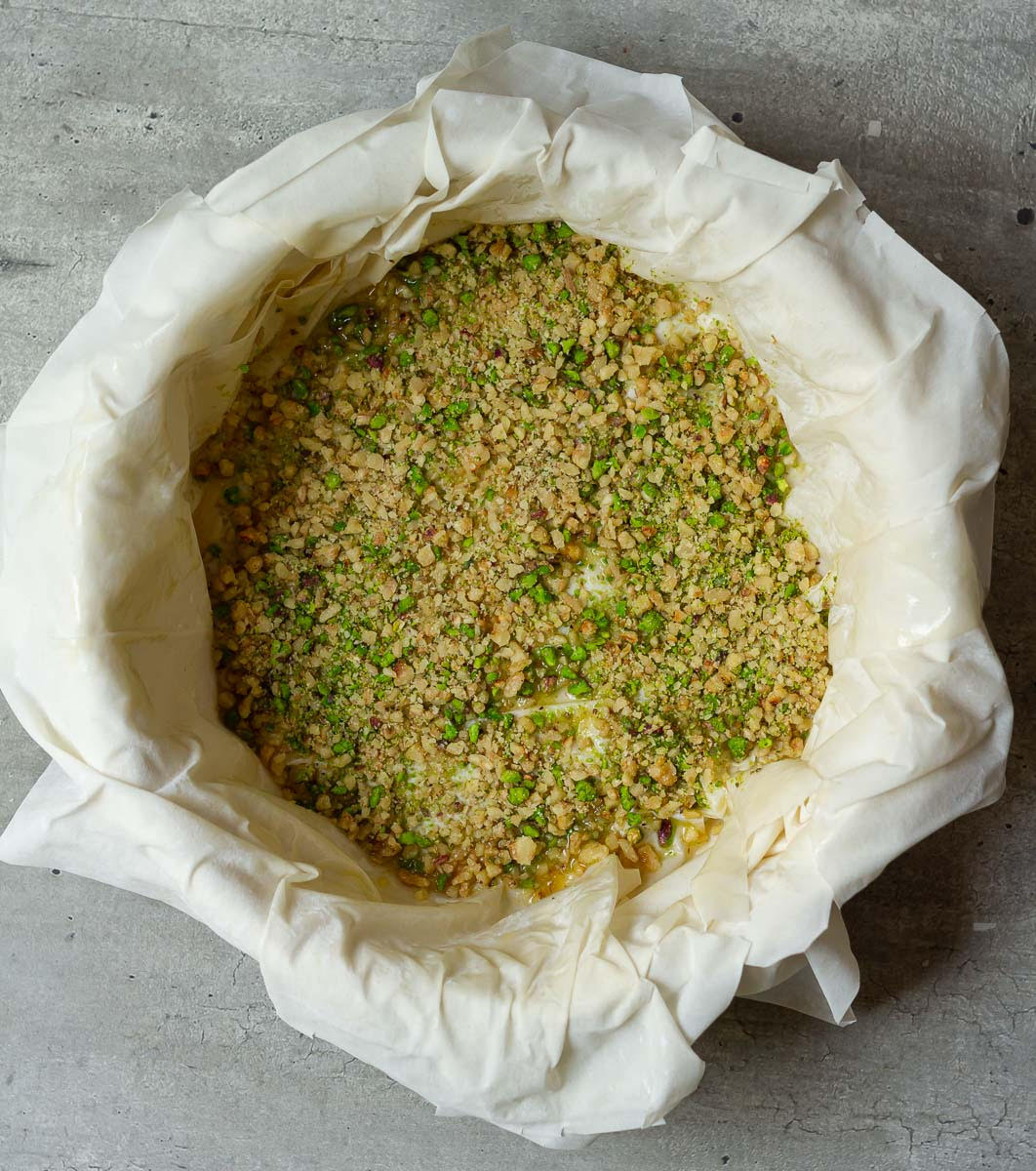Phyllo pastry crust with pistachios and walnuts on top.