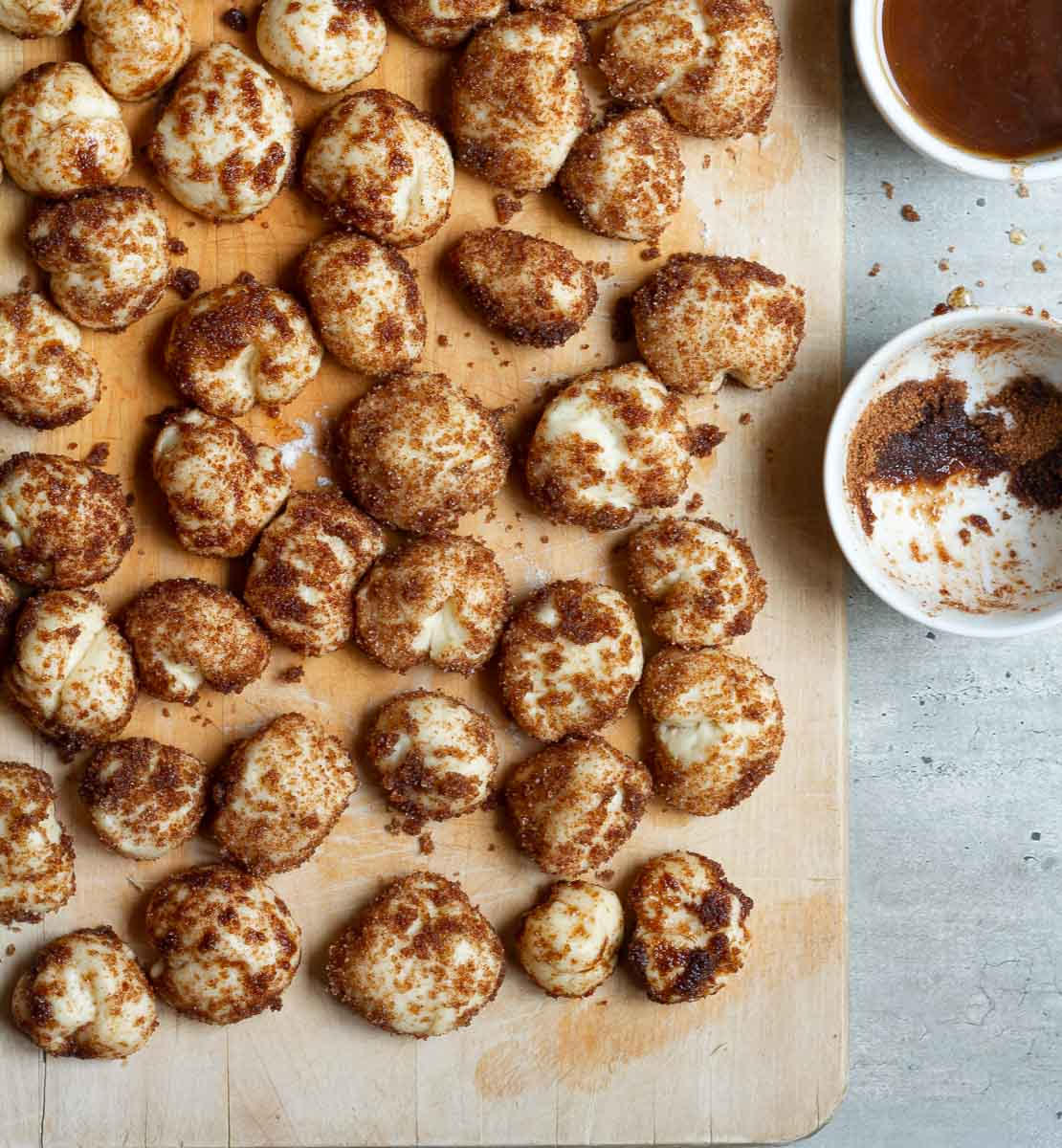 Dough dipped in butter and brown sugar and cinnamon.