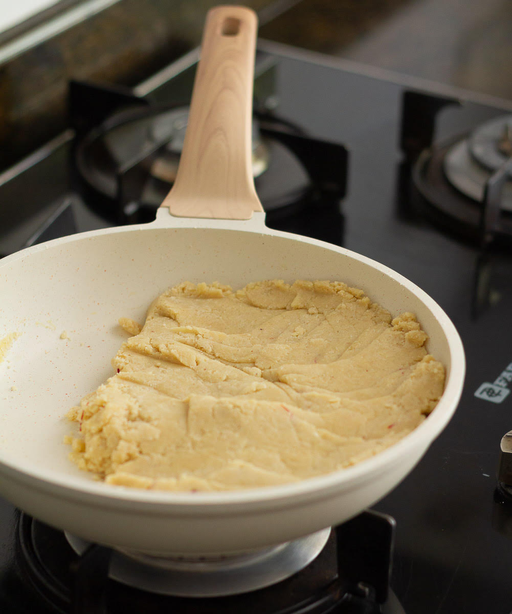 Mix dry ingredients into the sugar syrup and mix well