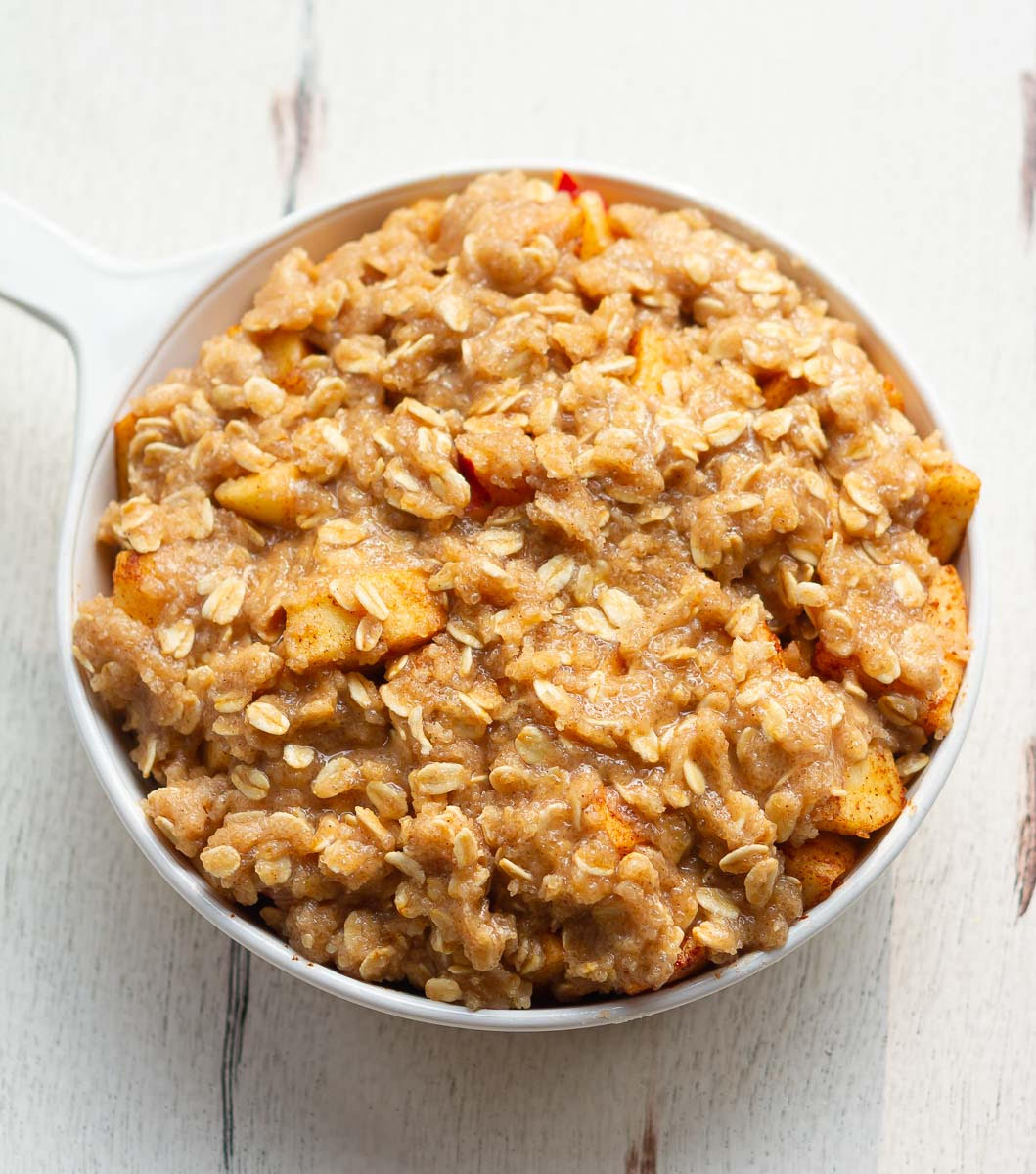 unbaked apple crisp in a baking dish.