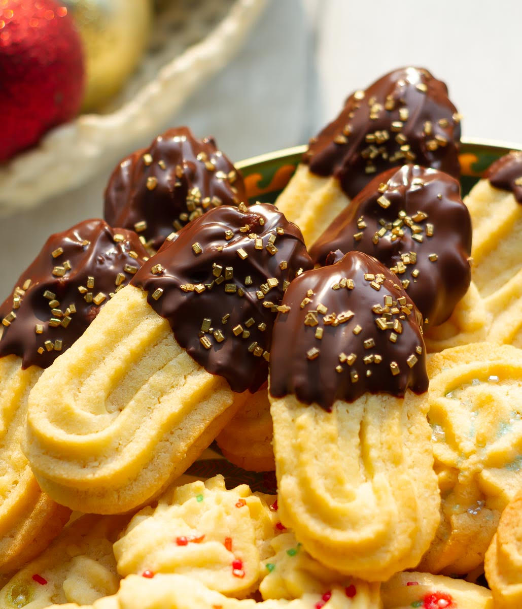 Spritz cookies dipped in chocolate.