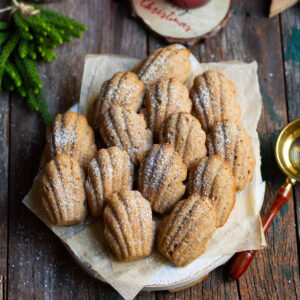 Gingerbread madeleines on parchment paper.