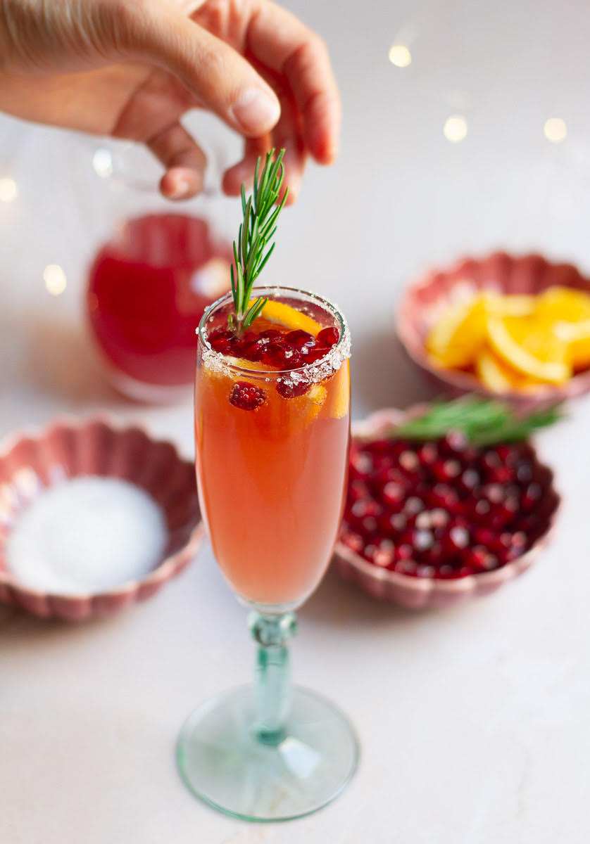 Garnish with orange slices and rosemary