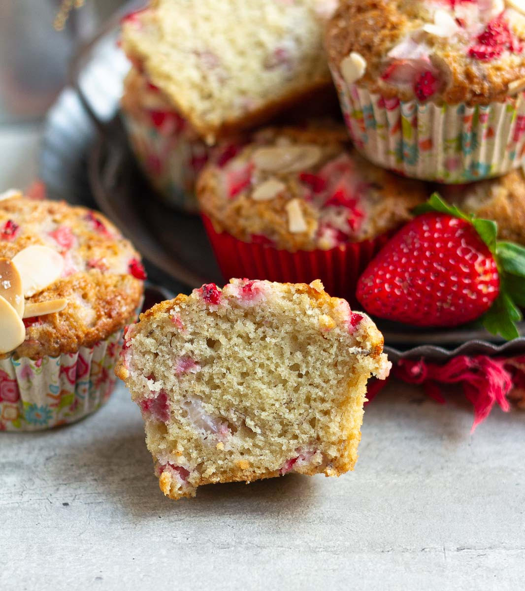 one half of a cut muffin to show the texture.