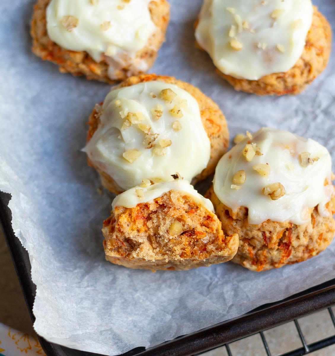 Half a cookie to show the texture of the carrot cake cookie.