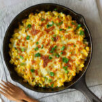 Korean Corn Cheese in a cast iron skillet.
