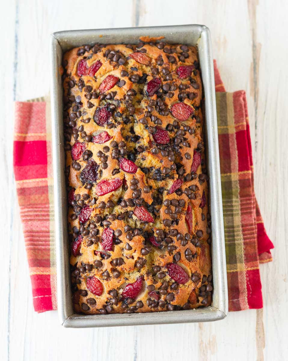 Baked Cherry Chocolate Chip Cake in a loaf pan.
