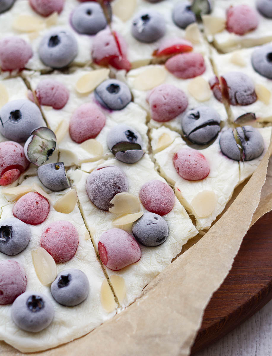 Frozen yogurt bark cut into pieces.