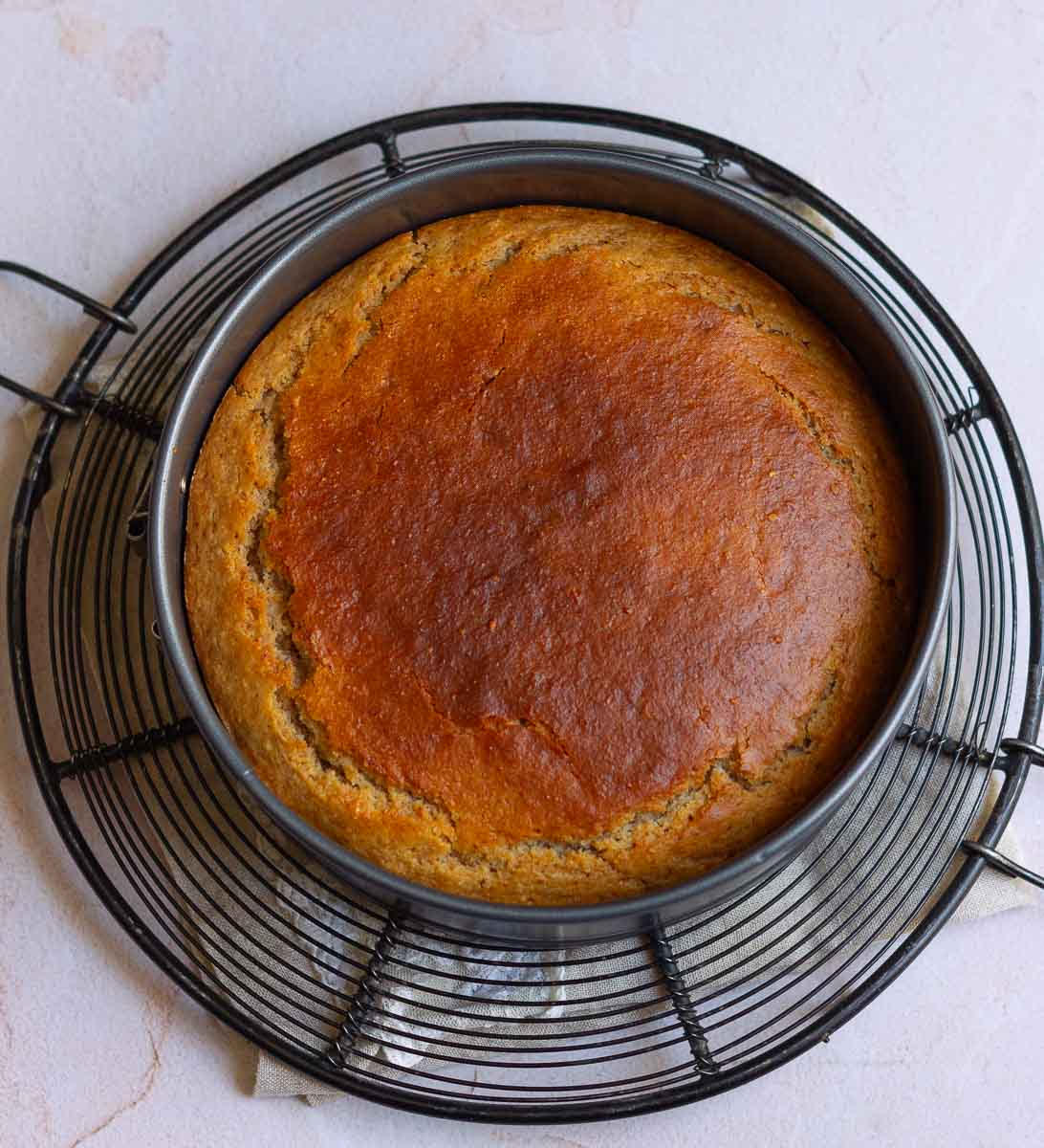 Baked Peach Cobbler Cake in a cake pan.