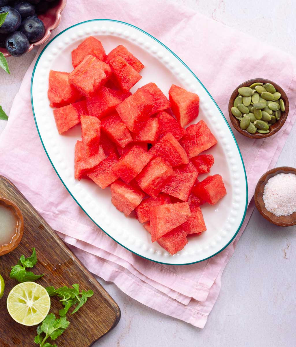 Cut watermelon pieces on a platter
