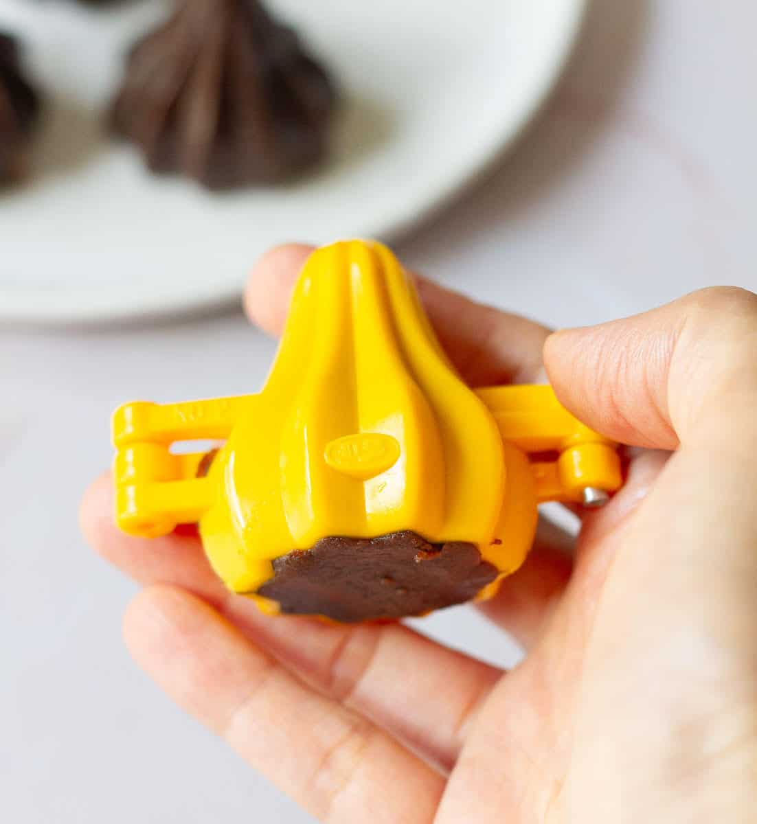 modak mold filled with dough