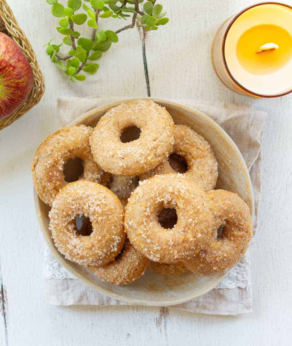 Baked Apple Donuts with Cinnamon Sugar on a plate.