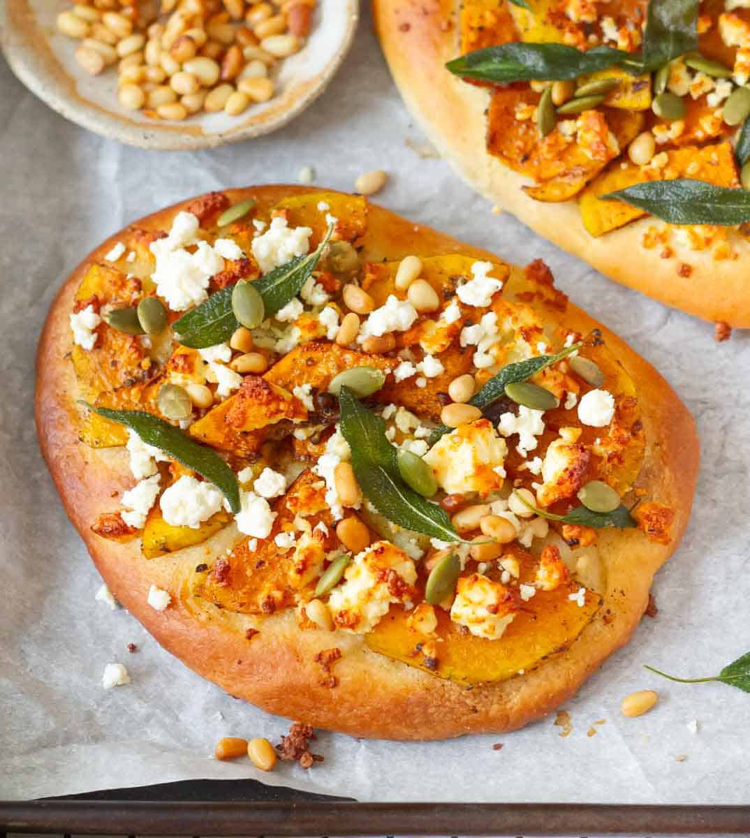 Butternut Squash Flatbread Pizza on parchment paper.