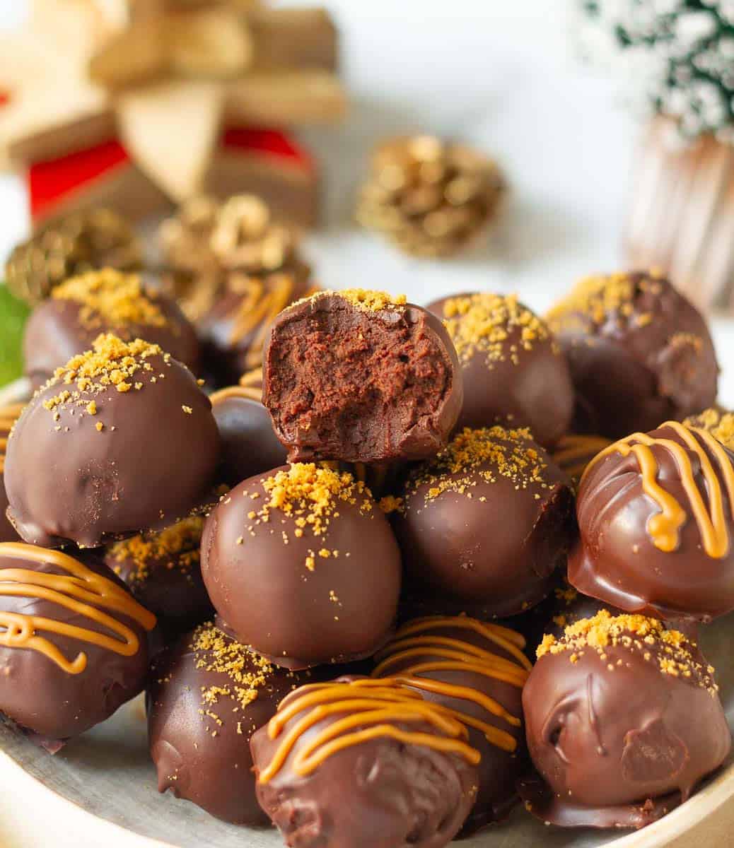 truffles on a plate with one half truffle to show the cross-section.