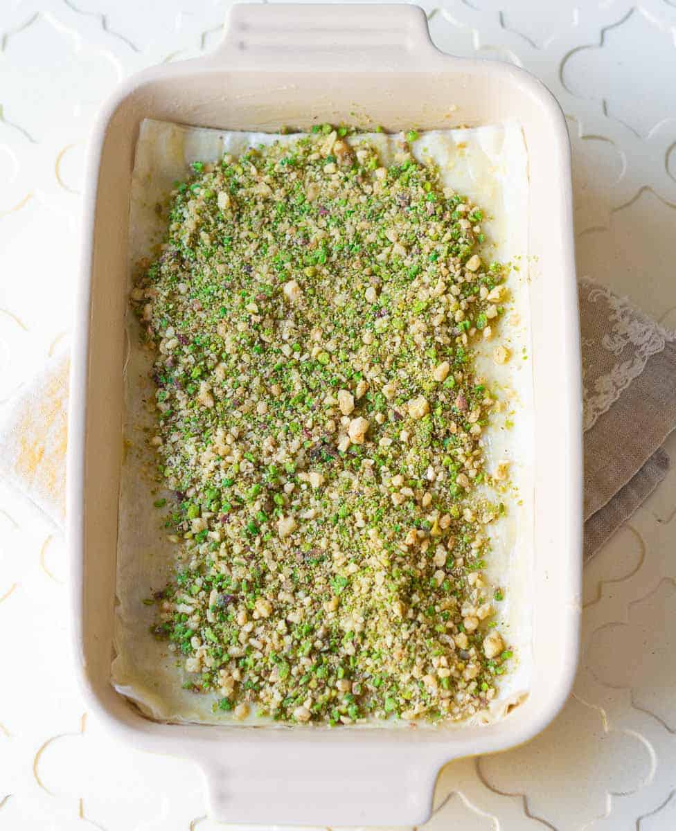 Sprinkle the nuts on the phyllo pastry
