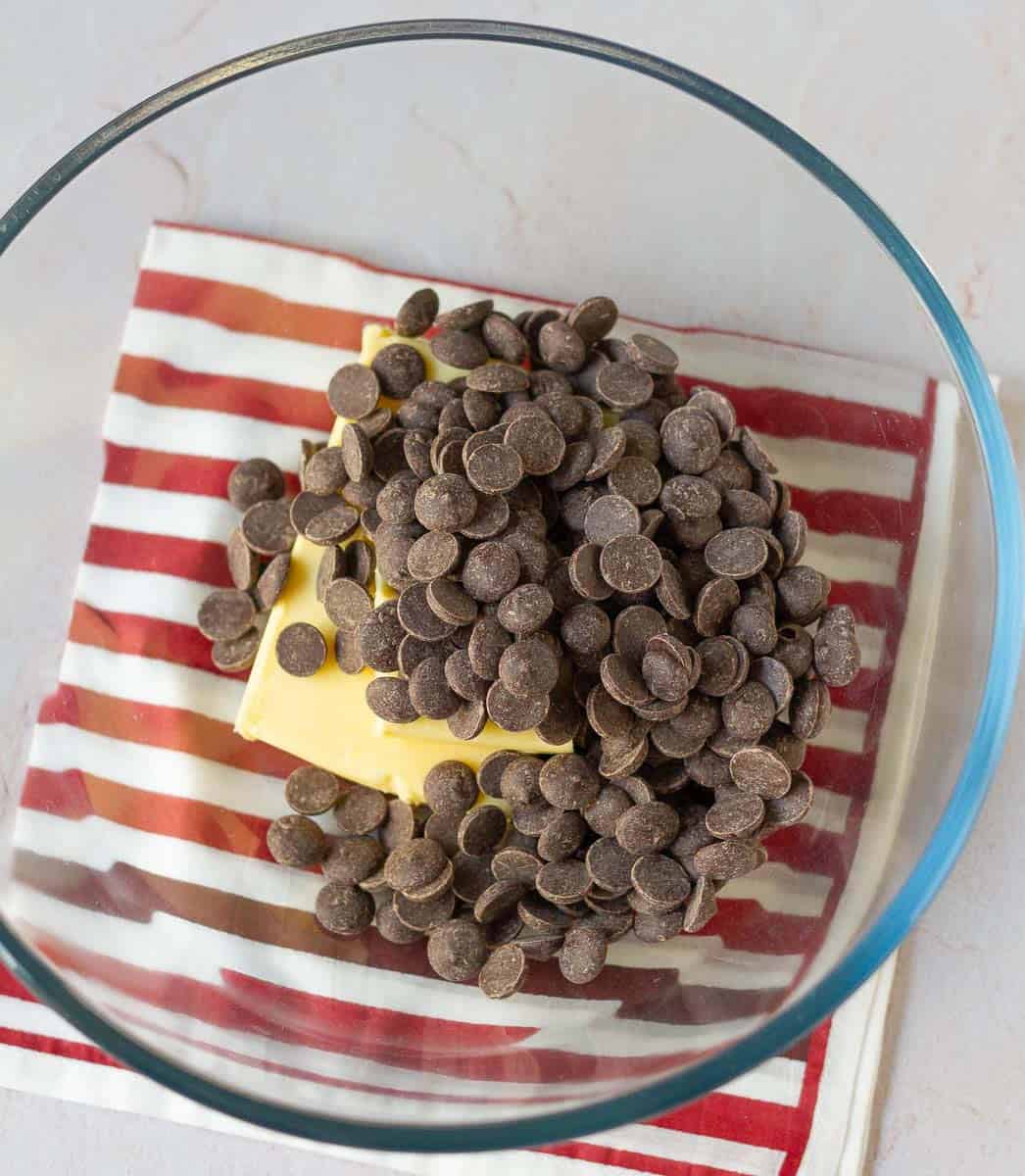 butter and chocolate chips in a glass bowl.