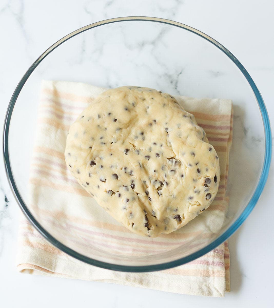 ready dough for chocolate chip shortbread cookies in a mixing bowl.