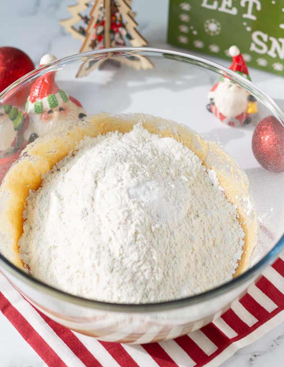 Sift in flour, baking soda baking powder into the egg butter mixture
