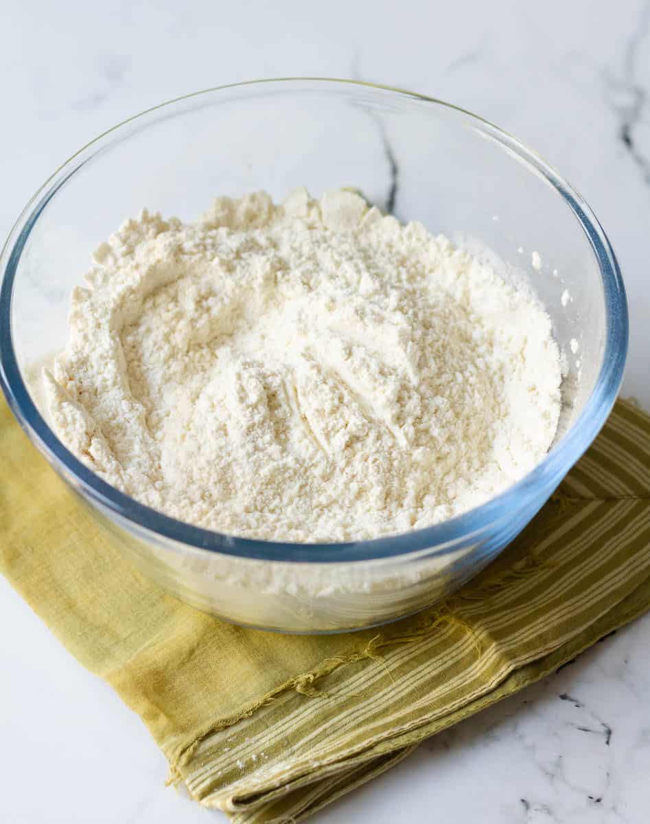Dry ingredients for the cookies in a glass bowl.