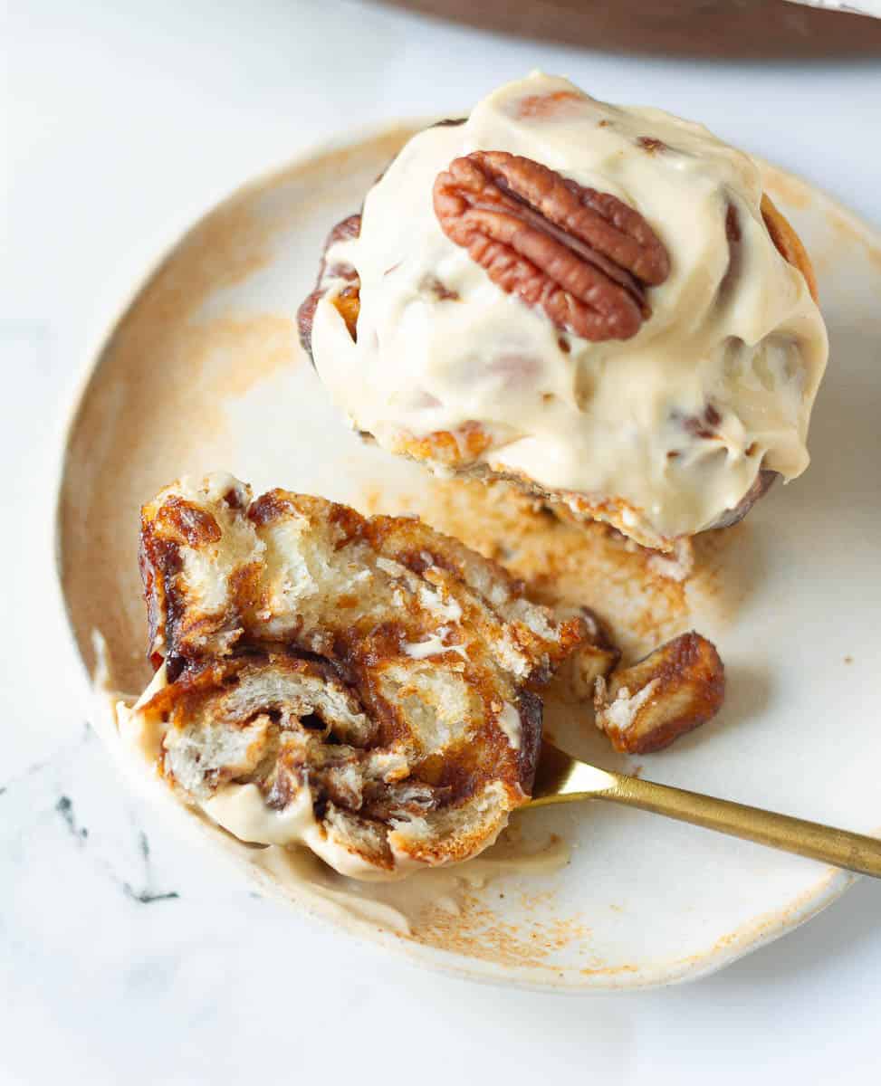 cross section of a coffee cinnamon roll on a small plate