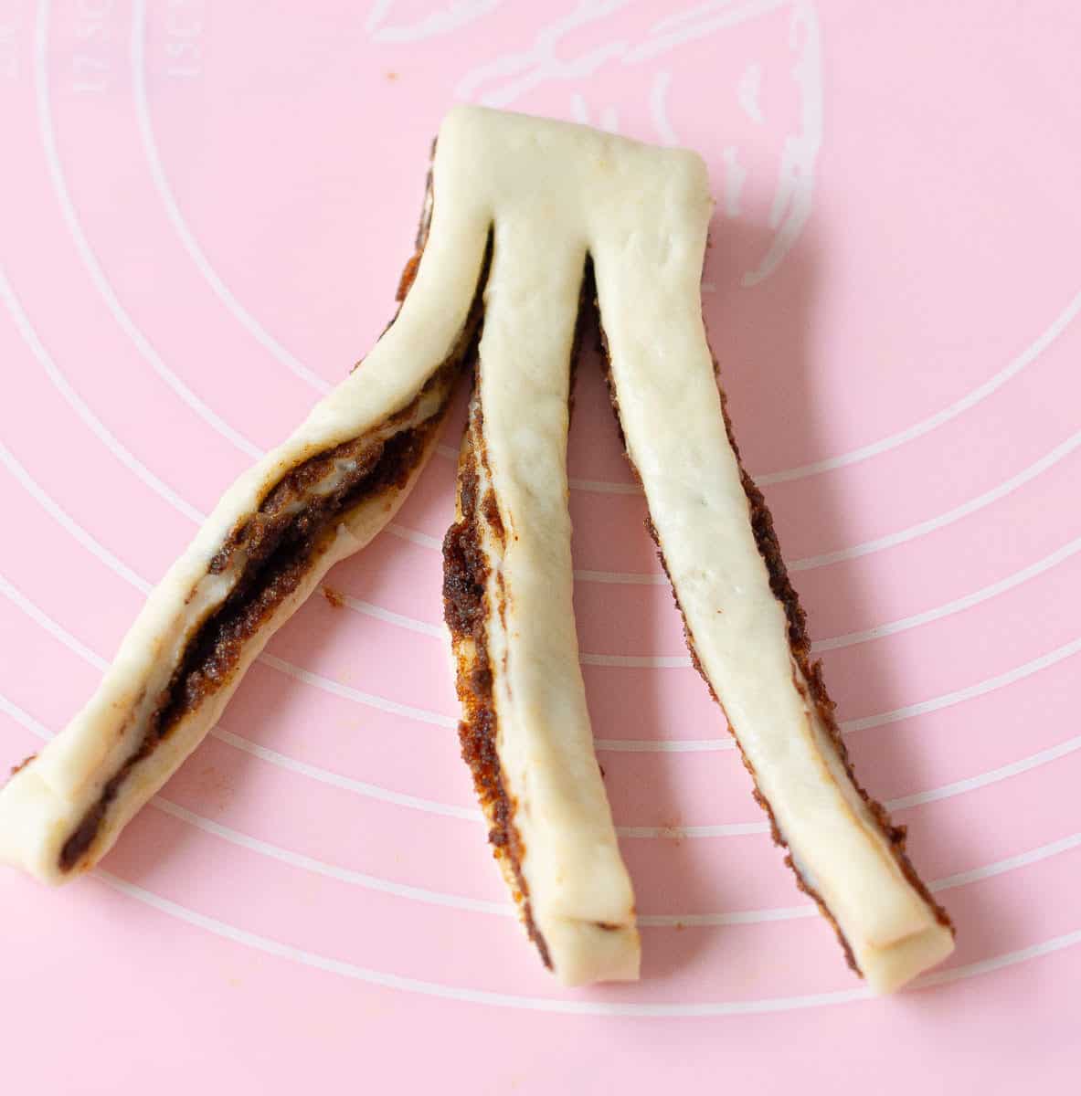 Strip of dough cut into 3 strips