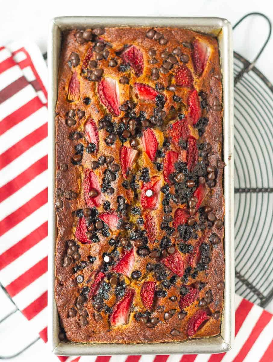 Baked Strawberry Banana Bread in a loaf tin.