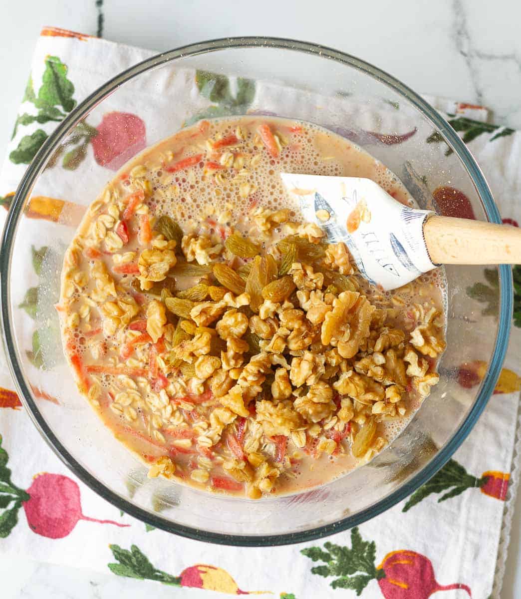 fold in walnuts and raisins into the carrot cake oats batter
