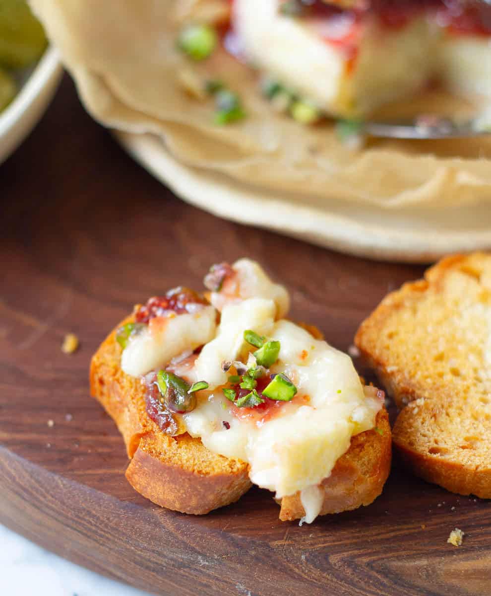 melted baked Brie on top of crostini