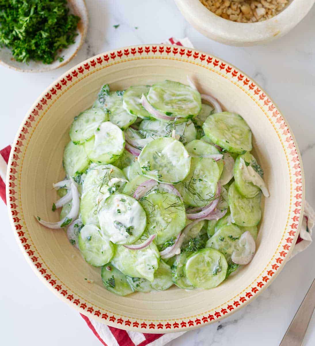 Creamy Cucumber Salad with Greek Yogurt in a serving bowl
