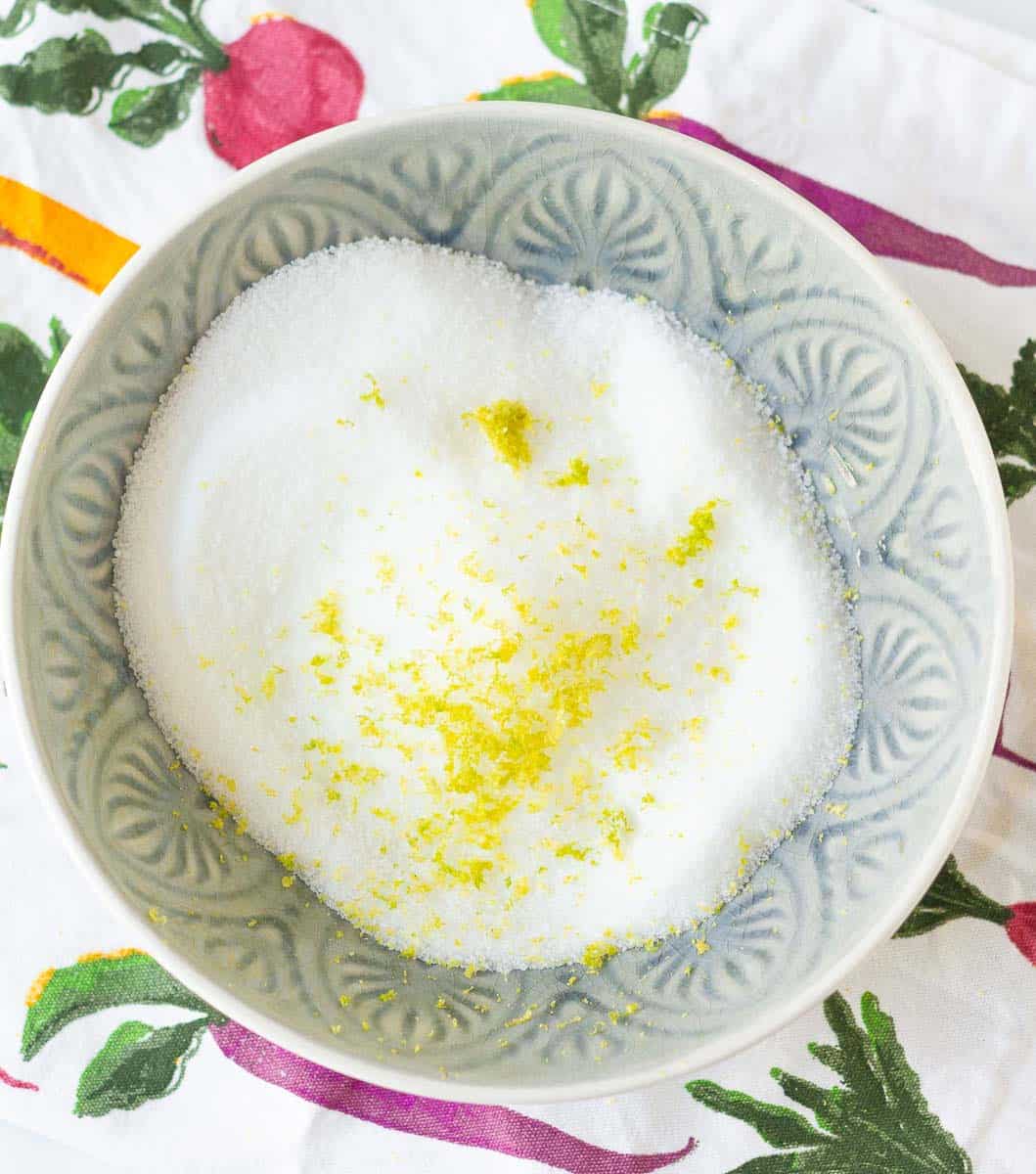 lemon zest infused sugar in a bowl.