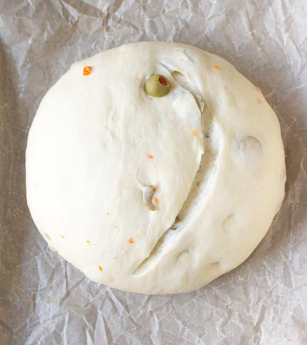 slashed olive bread dough