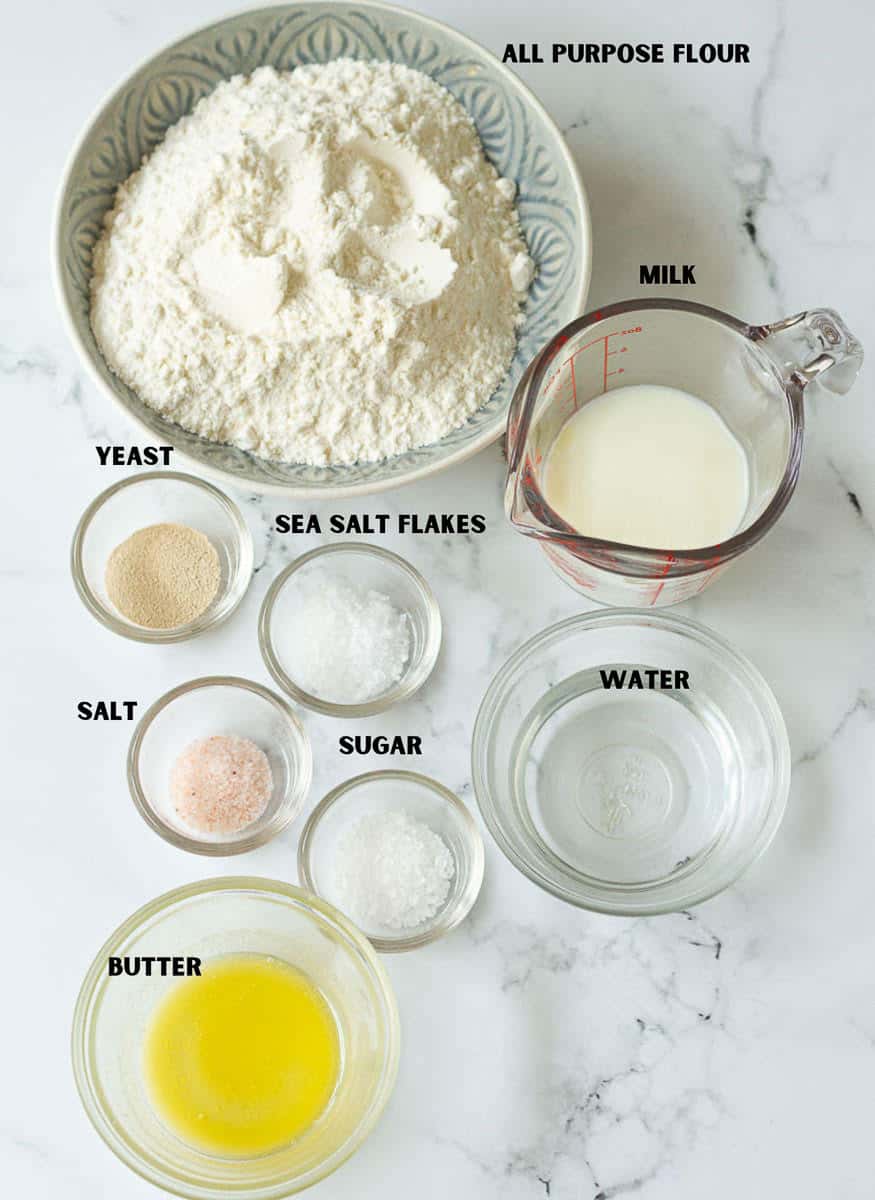 Labelled ingredients for making salted butter bread rolls.