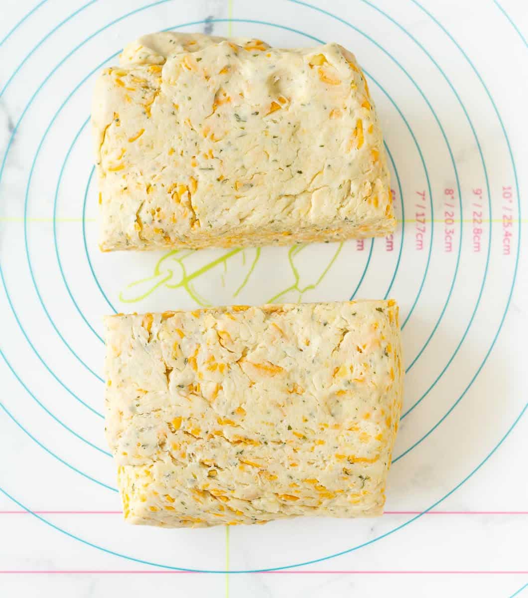 cheddar cheese scone dough divided into 2 halves