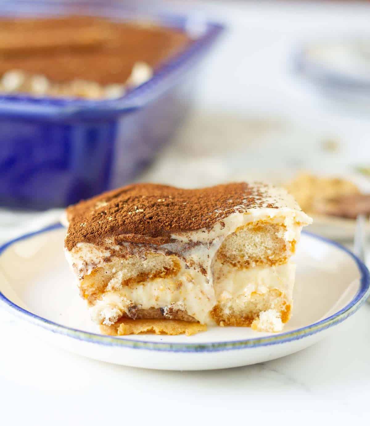 A slice of chai tiramisu on a small plate.