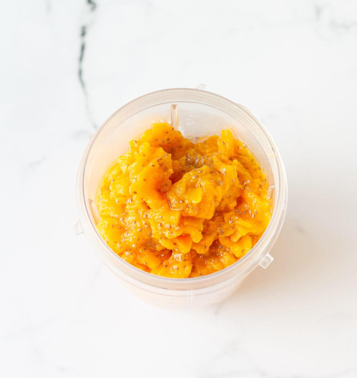 persimmon chia seed mixture in a blender.