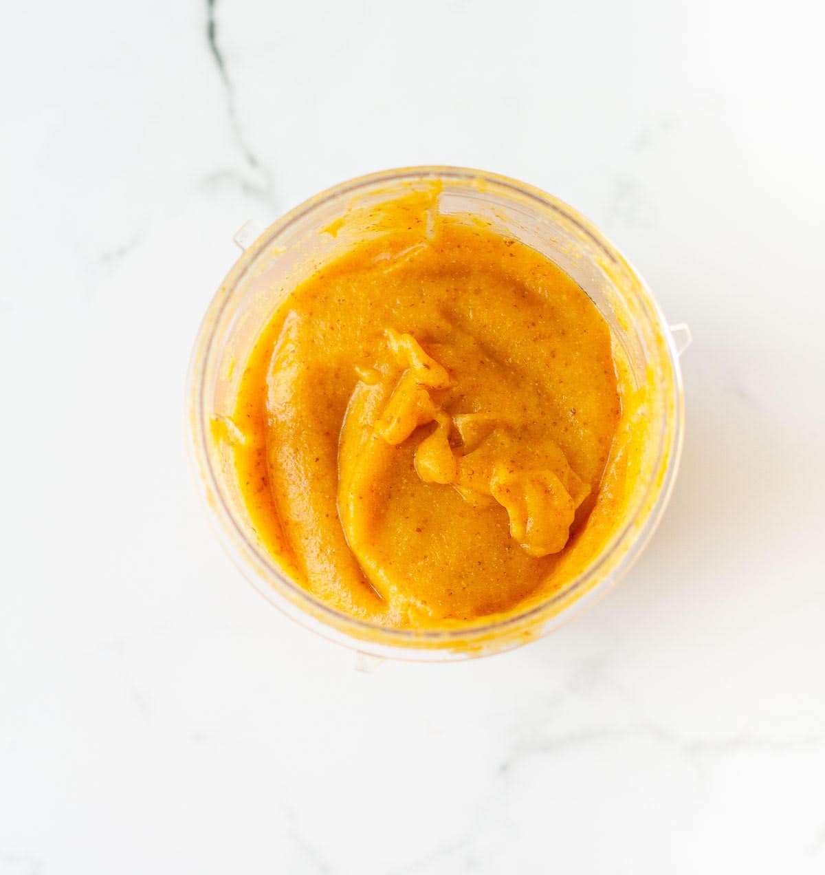 blended persimmon chia jam in a blender jar.