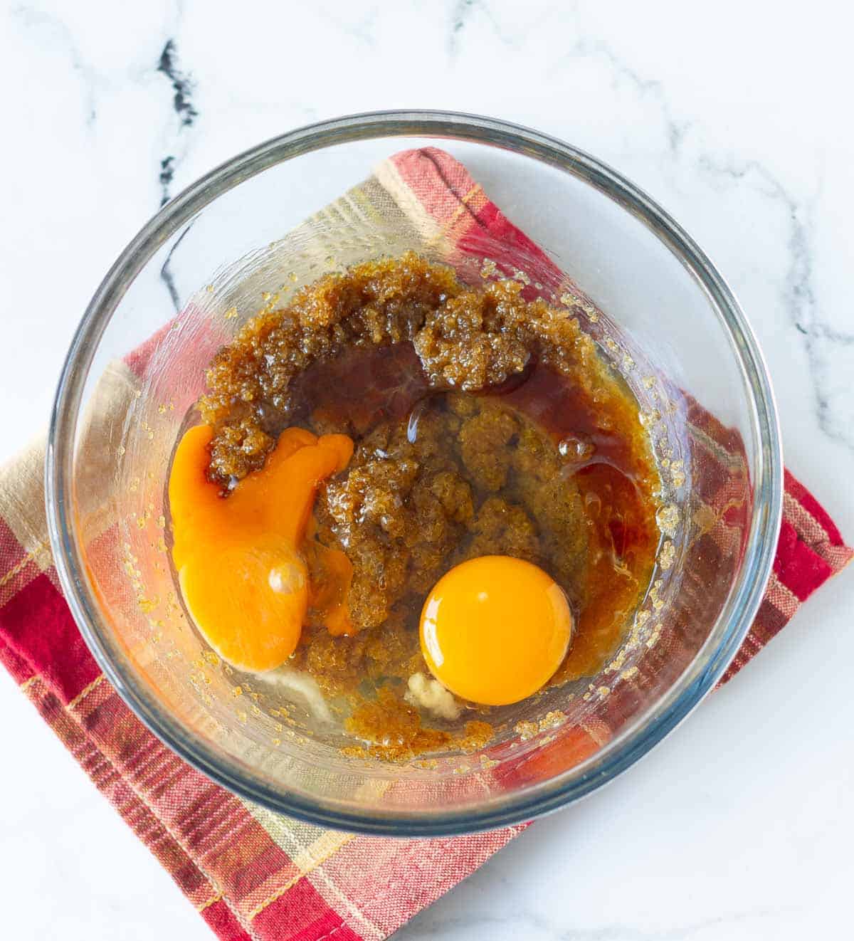 sugar, eggs, honey, butter in a mixing bowl for making pie filling.