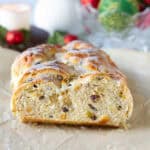 sliced stollen bread on parchment paper.