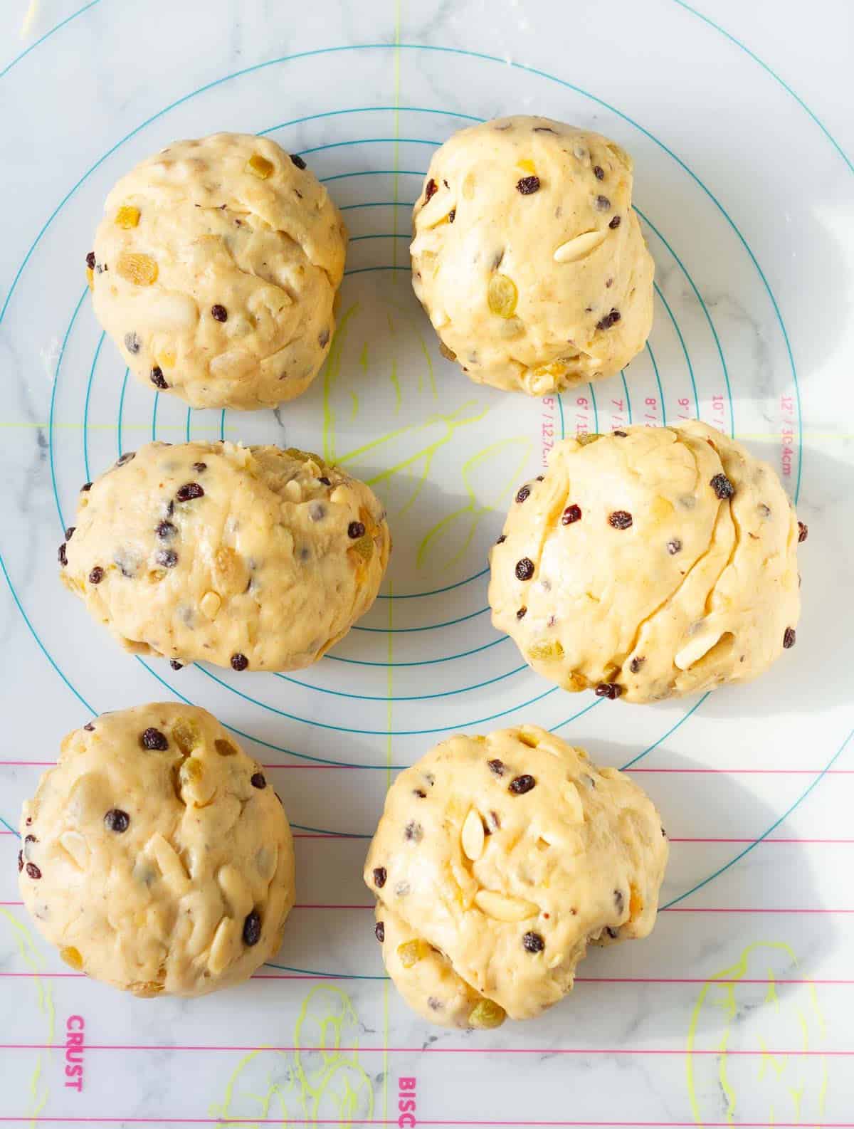 bread dough divided into 6 pieces.