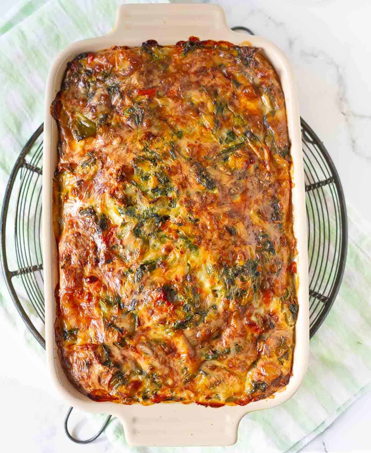 baked breakfast casserole in a baking dish.