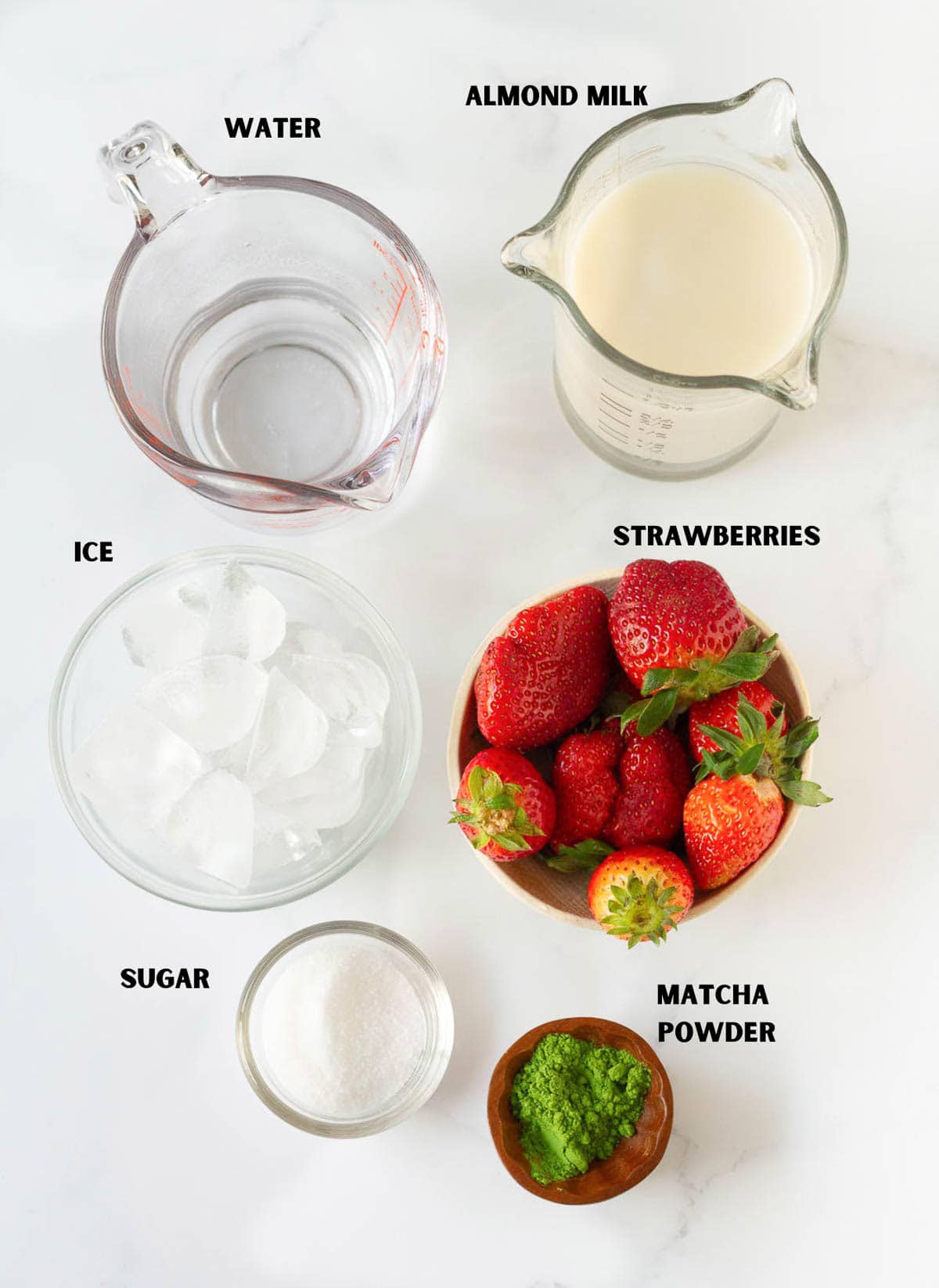 Ingredients for strawberry matcha latte.