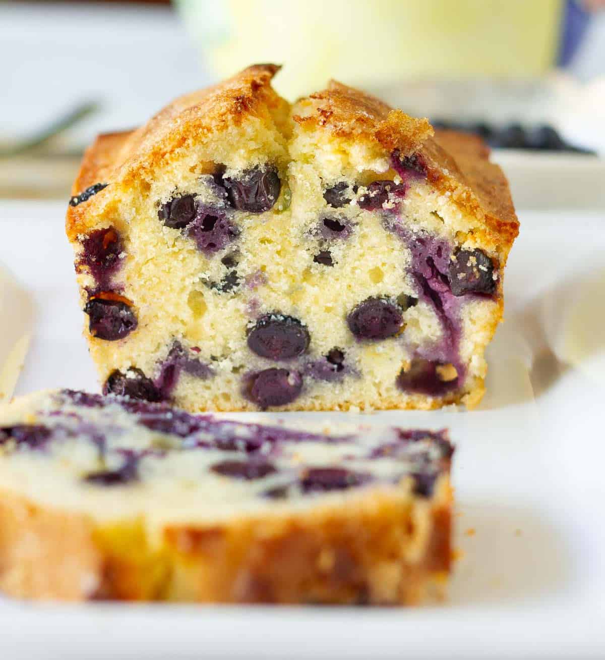 Sliced blueberry lemon bread to show the soft texture.