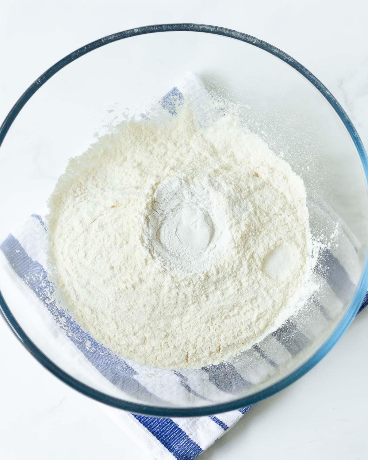 Flour, salt, and baking powder in a mixing bowl.