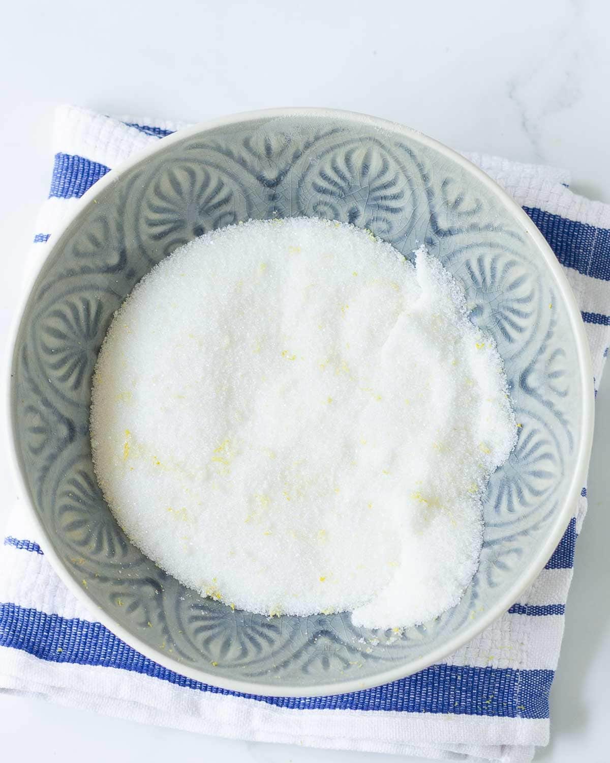 Lemon zest and sugar in a small bowl.