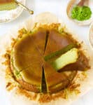 Sliced matcha basque cheesecake on parchment paper.