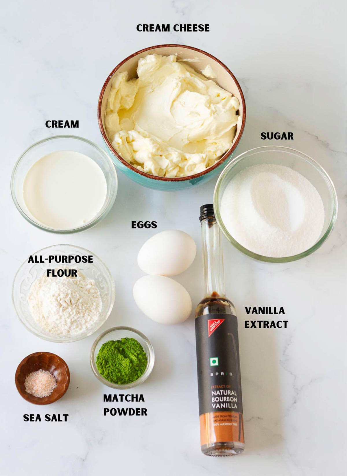 Ingredients for making matcha basque cheesecake.