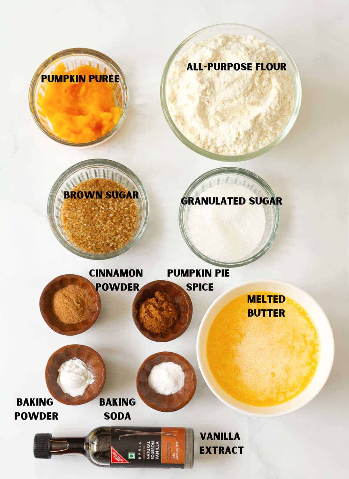 Labelled ingredients for making pumpkin snickerdoodles.